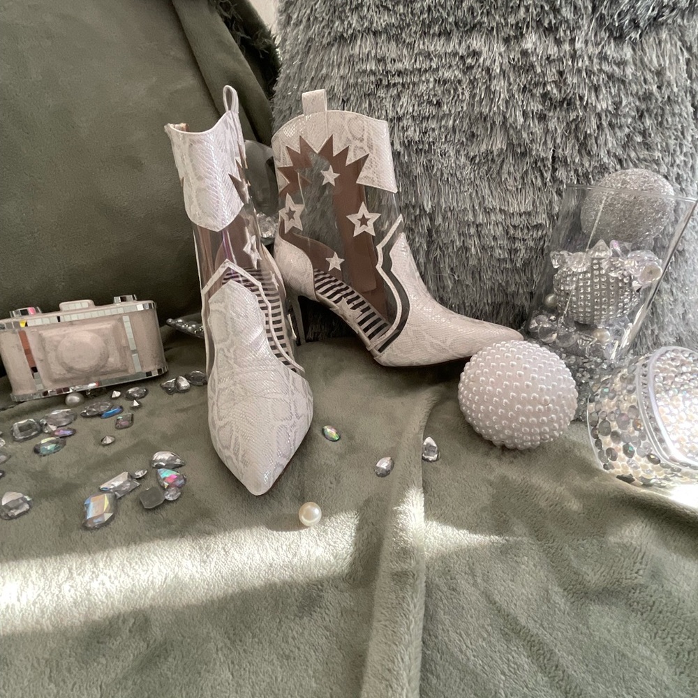 BETSEY JOHNSON snakeskin booties.